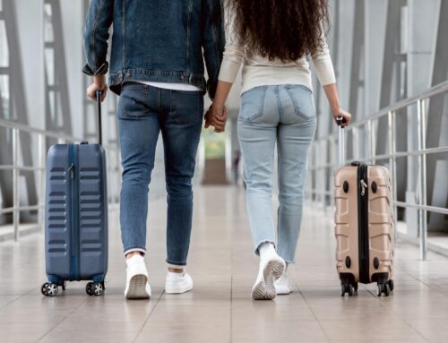 Traveling to See Your Partner’s Family for the Holidays? How to Ease Anxiety, According to Experts
